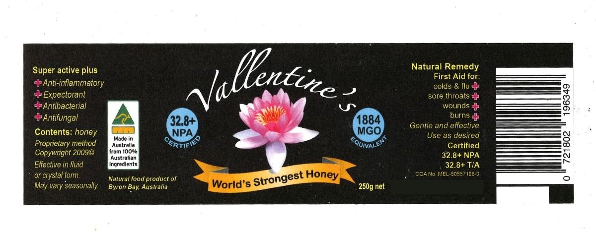 Valentine's World's Strongest Honey label with a pink flower graphic on a white background